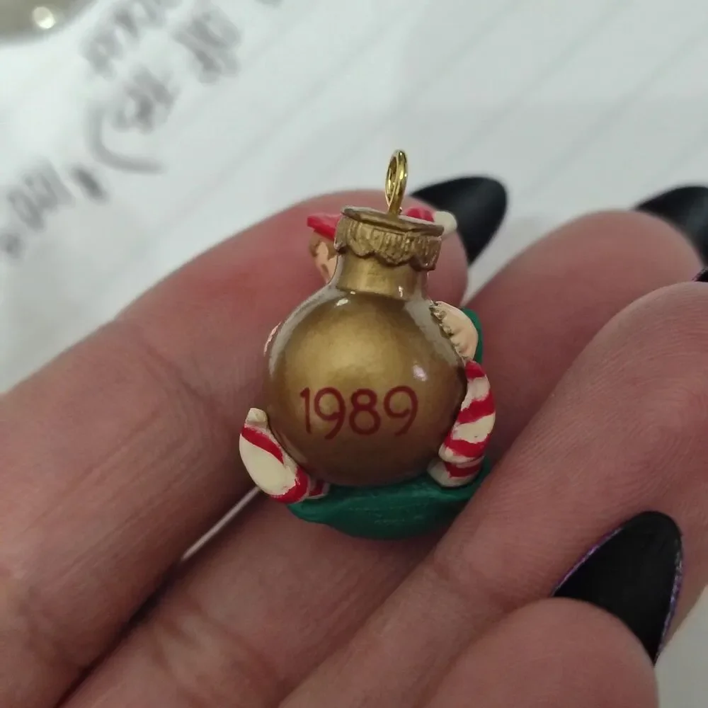 VTGHallmark  Load of Cheer  Elf Holding on to Globe Ornament - Miniature